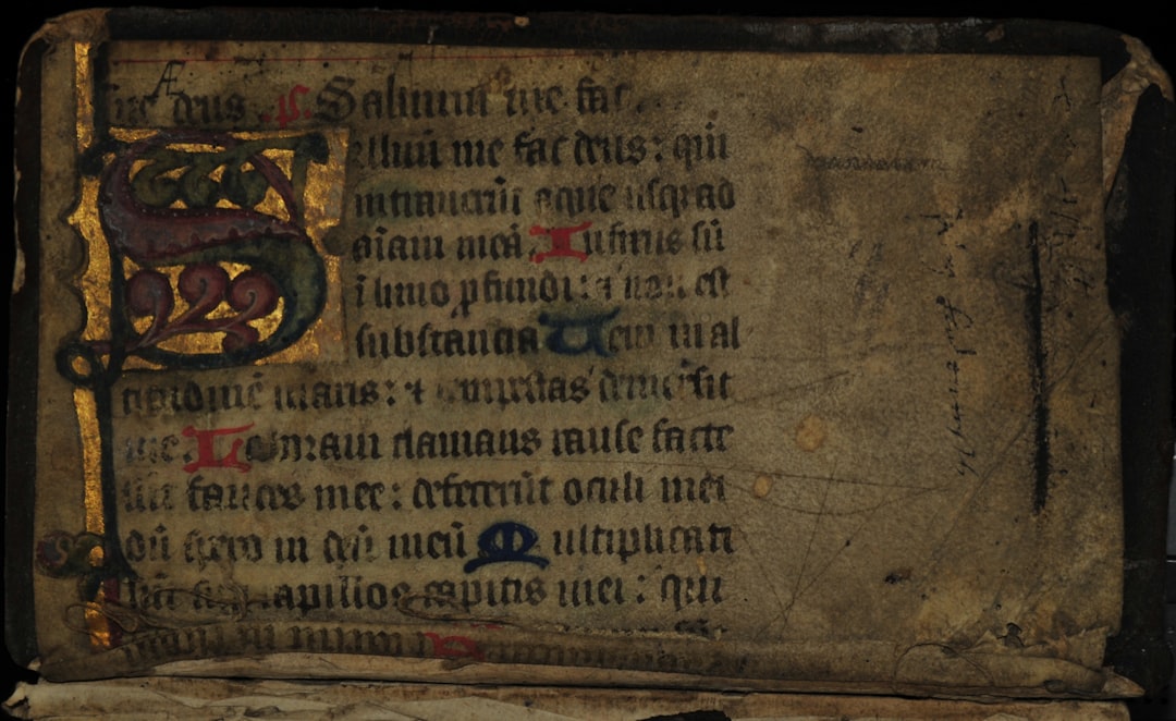 Calendar page for January showing labors of the month with architectural border decoration